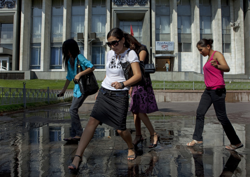 Girls Avoiding To Get Wet, Bishkek, Kyrgyzstan