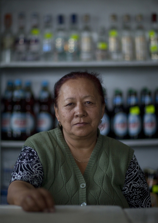 Old Woman Behind The Counter Of Her Store, Kochkor, Kyrgyzstan