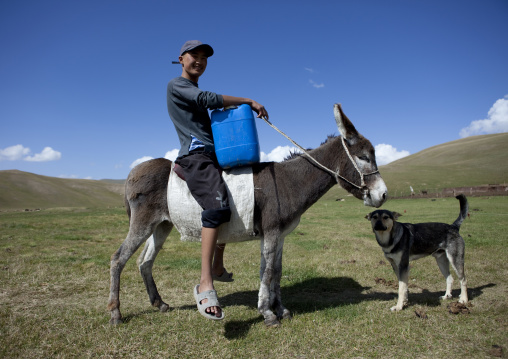 Boy With A Jerrycan On A Donkey, Jaman Echki Jailoo Village, Song Kol Lake Area, Kyrgyzstan