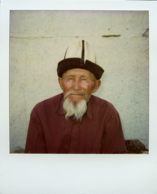 Picture Of An Old Bearded Wearing A Kalpak Hat, Kyrgyzstan