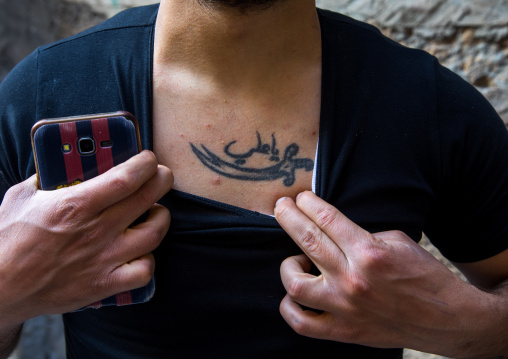 Ashura tattoo on the chest of a lebanese man, South Governorate, Tyre, Lebanon