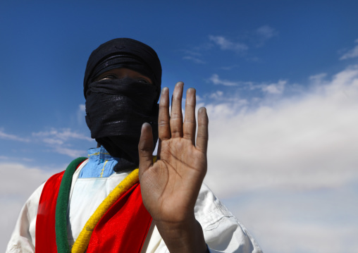 Tuareg man waving his hand, Tripolitania, Ghadames, Libya