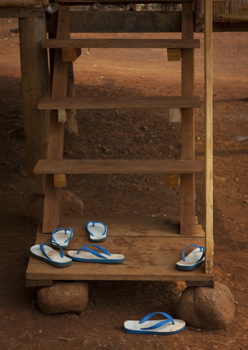 Slippers on a stair in front of a house, Katou, Laos