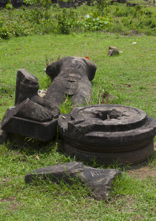 Fallen statue at wat phu khmer temple, Champasak, Laos