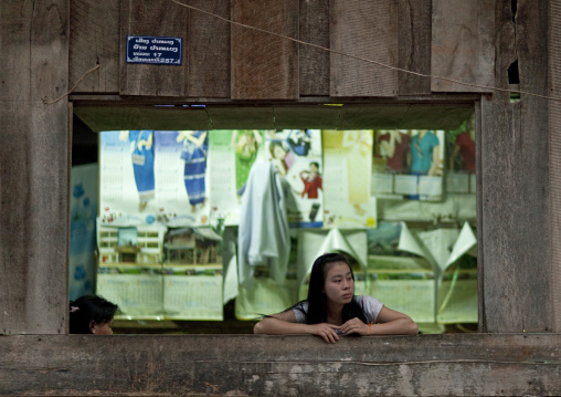 Girl at a window, Houei xay, Laos