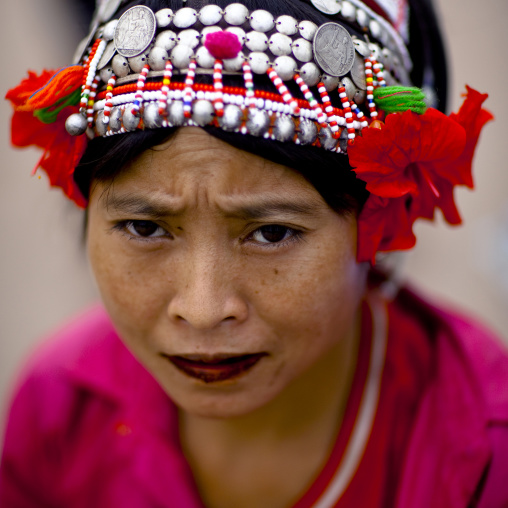 Akha minority woman with traditional headdress, Ban ta mi, Laos
