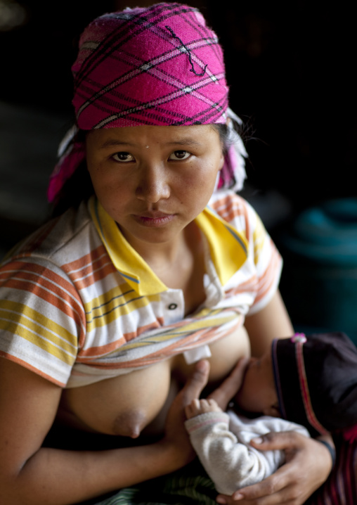 Akha minority breastfeeding woman, Muang sing, Laos