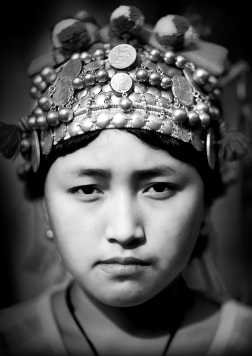 Akha minority woman with traditional headdress, Muang sing, Laos