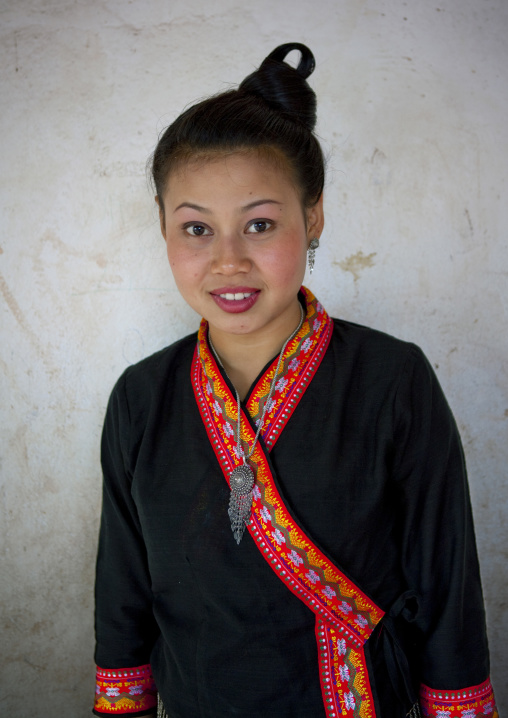 Girl in traditional clothing during pii mai lao new year celebration, Luang prabang, Laos