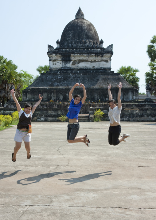 Girls jumping, Vat visunarat, Luang prabang, Laos