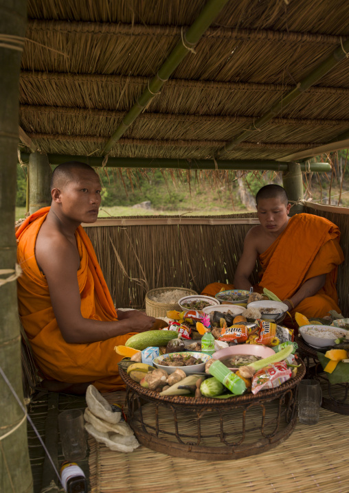 Monks during a death ceremony, Phonsavan, Laos