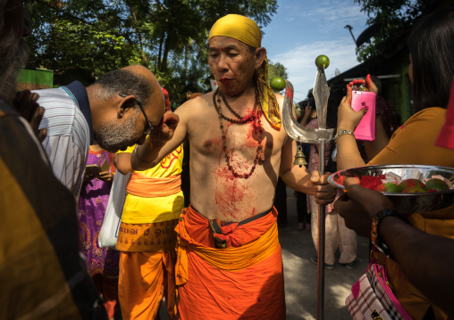 Hindu Man Blessing A Devotee In Annual Thaipusam Religious Festival In Batu Caves Blessing A Pilgrim, Southeast Asia, Kuala Lumpur, Malaysia