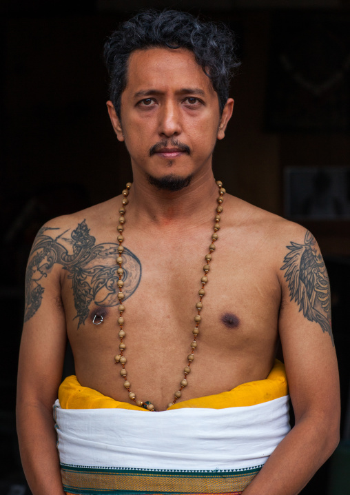 Portrait Of An Hindu Devotee With Tattoos In Annual Thaipusam Religious Festival In Batu Caves, Southeast Asia, Kuala Lumpur, Malaysia
