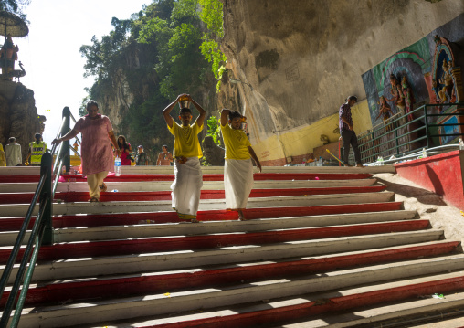 Hindu Devotees On Stairs With Water Jugs On Their Heads In Annual Thaipusam Religious Festival In Batu Caves, Southeast Asia, Kuala Lumpur, Malaysia