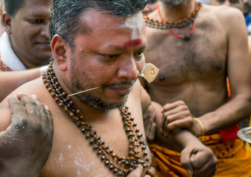Hindu Devotee With Pierced Tongue During Annual Thaipusam Religious Festival In Batu Caves, Southeast Asia, Kuala Lumpur, Malaysia