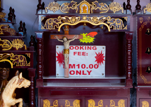 Jesus Crucifix For Sale During Annual Thaipusam Religious Festival In Batu Caves, Southeast Asia, Kuala Lumpur, Malaysia