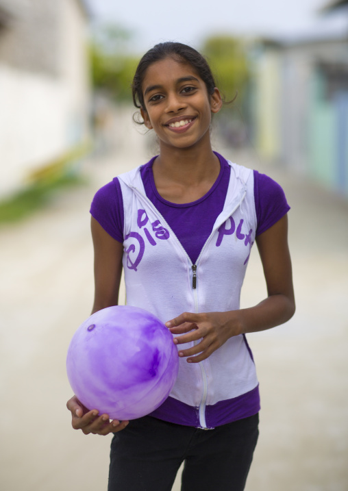 Young Girl With A Ball, Eydhafushi, Baa Atoll, Maldives