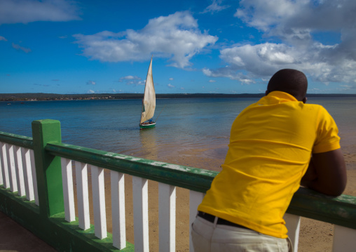 Man Looking At A Dhow In The Bay, Inhambane, Inhambane Province, Mozambique