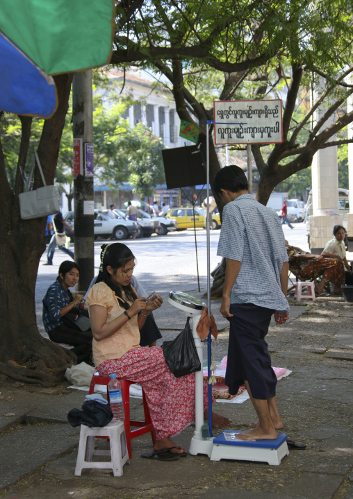 Balance In The Street, Rangoon, Myanmar