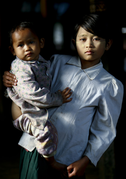 Young Girl Holding Her Baby Brother, Inle Lake, Myanmar