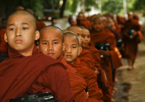 Novices Buddhist Monks Luncht At Mahagandayon Monastery In Amarapura, Myanmar