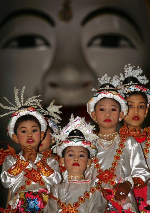Young Girls During A Buddhist Ceremony In Mandalay, Myanmar