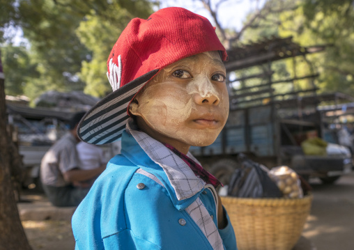 Boy With Thanaka On His Face And Wearing A Baseball Cap, Bagan, Myanmar