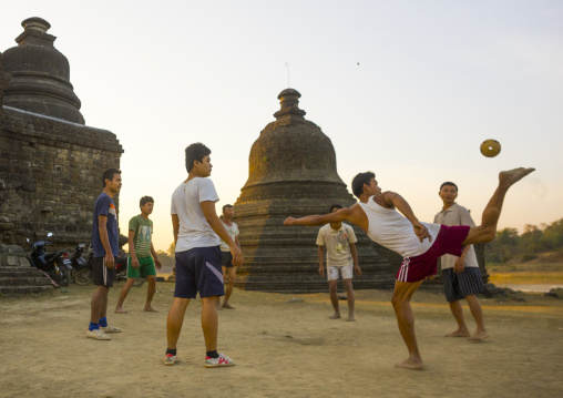 Men Playing Chinlone In Front Of Stupas, Myanmar
