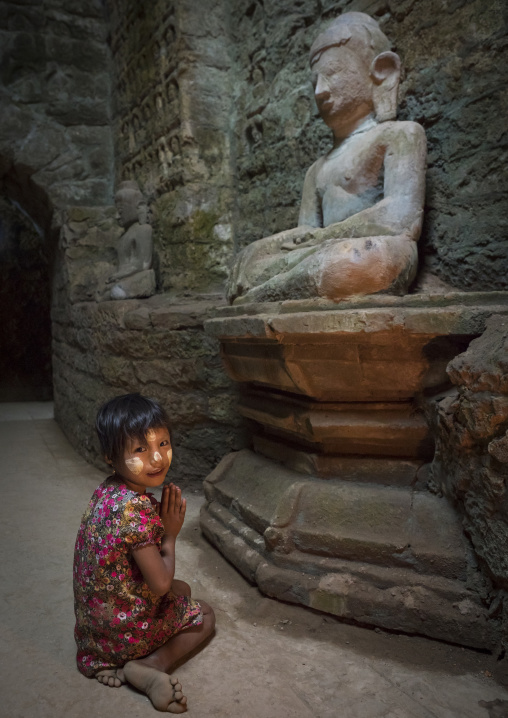 Little Girl Praying Inside Kothaung Temple, Mrauk U, Myanmar
