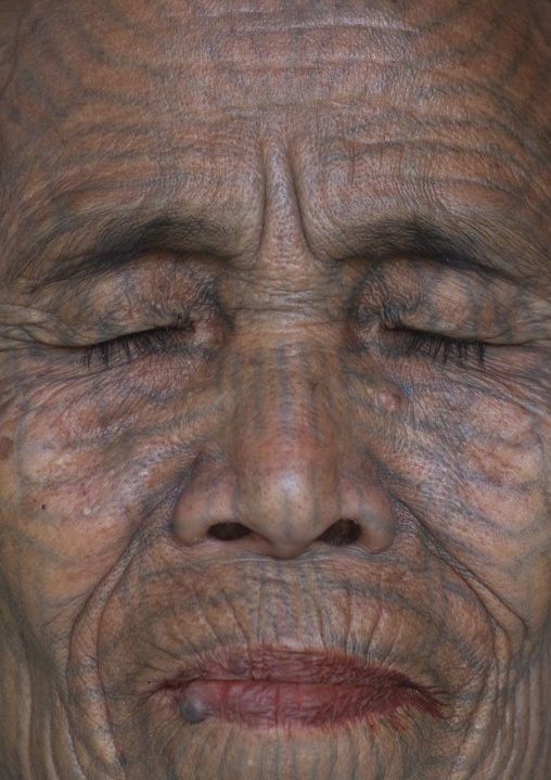 Tribal Chin Woman With Spiderweb Tattoo On The Face And Closed Eyes, Mrauk U, Myanmar