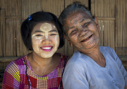 Tribal Chin Woman With Spiderweb Tattoo On Her Face With Her Little Daughter, Mrauk U, Myanmar