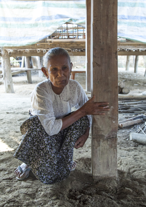 Rohingya Woman Showing The Pillar Of Her House Cut By 969 Extremists Buddhists, Thandwe, Myanmar