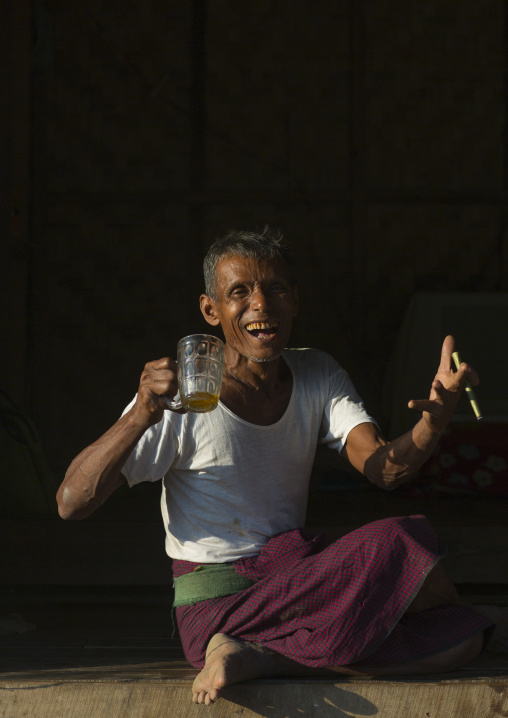 Rohingya Man Drinking, Thandwe, Myanmar