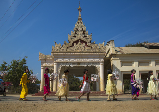 Women Walking To The Temple With Offerings For A Novitiation Ceremony, Bagan,  Myanmar