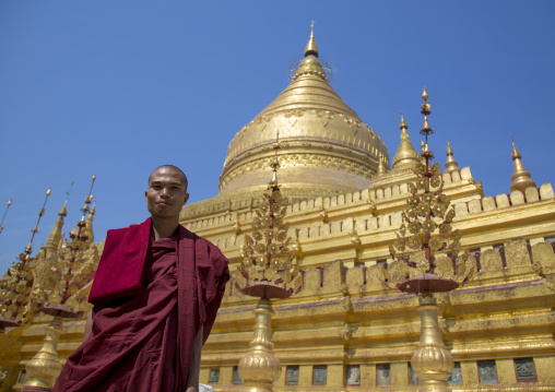 Monk In Front Of Shwe Zigon Paya Golden Temple, Bagab, Myanmar
