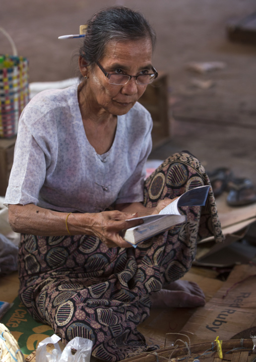 Old Woman Reading A Book, Ngapali, Myanmar