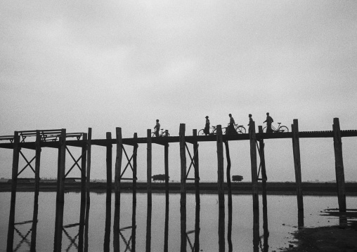 People Crossing U Bein Bridge In Amarapura, Mandalay, Myanmar