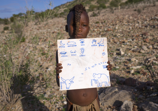Himba Child Holding A Paper With Himba Words, Epupa, Namibia
