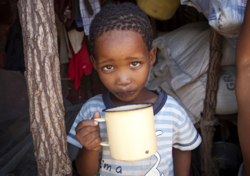 Bushman Child Boy Drinking Milk, Tsumkwe, Namibia