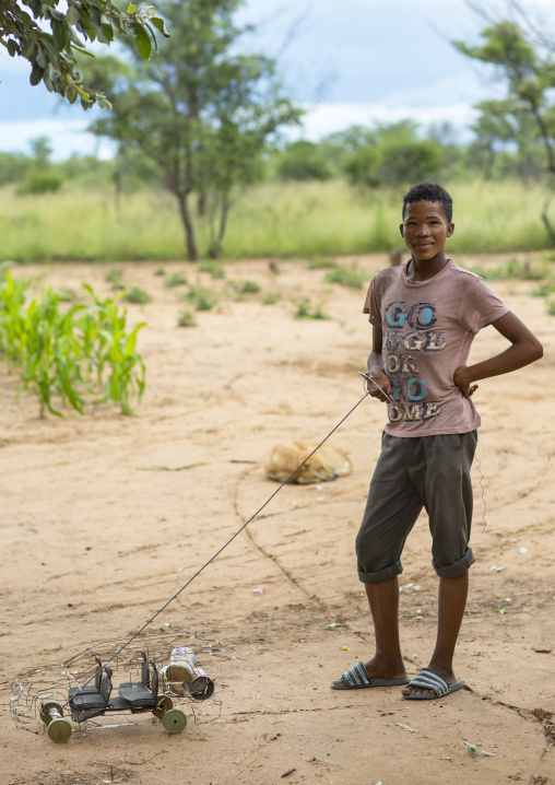 Bushman Child With A Car Toy, Tsumkwe, Namibia