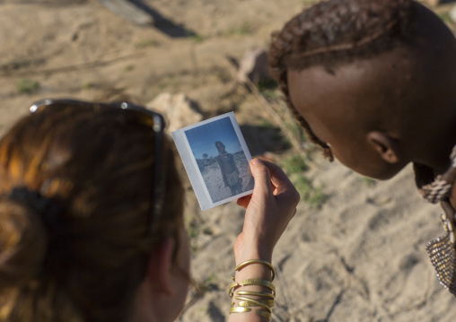 Himba Child Discovering His Polaroid, Epupa, Namibia