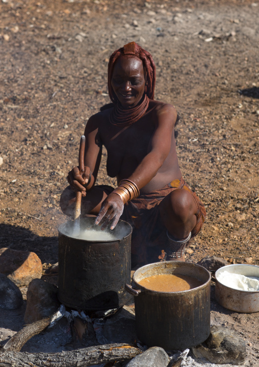 Himba Woman Cooking, Epupa, Namibia