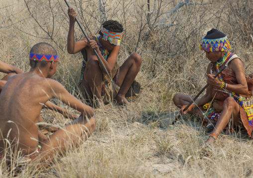 San Women Digging To Find Water Tubers, Namibia