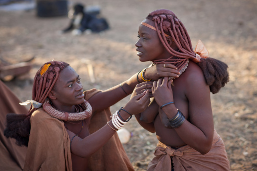 Himba Women Dressing Up, Karihona Village, Ruacana Area, Namibia