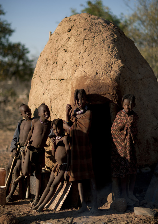 Himba Kids Leaning On A Hut, Karihona Village, Ruacana Area, Namibia