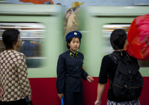 Subway leaving the station in front of a North Korean employee, Pyongan Province, Pyongyang, North Korea