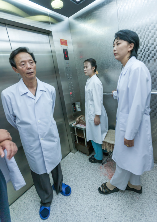 North Korean doctors in an elevator in a maternity, Pyongan Province, Pyongyang, North Korea