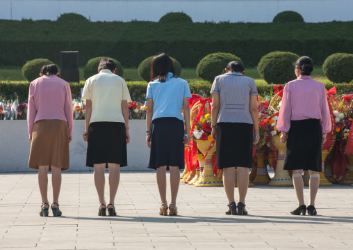 North Korean women paying respect in the Grand monument on Mansu hill, Pyongan Province, Pyongyang, North Korea