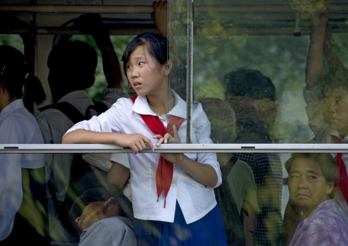 North Korean pioneer girl in a bus, Pyongan Province, Pyongyang, North Korea