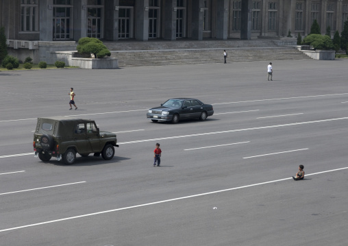 North Korean children playing in the middle of the road in the city, Pyongan Province, Pyongyang, North Korea